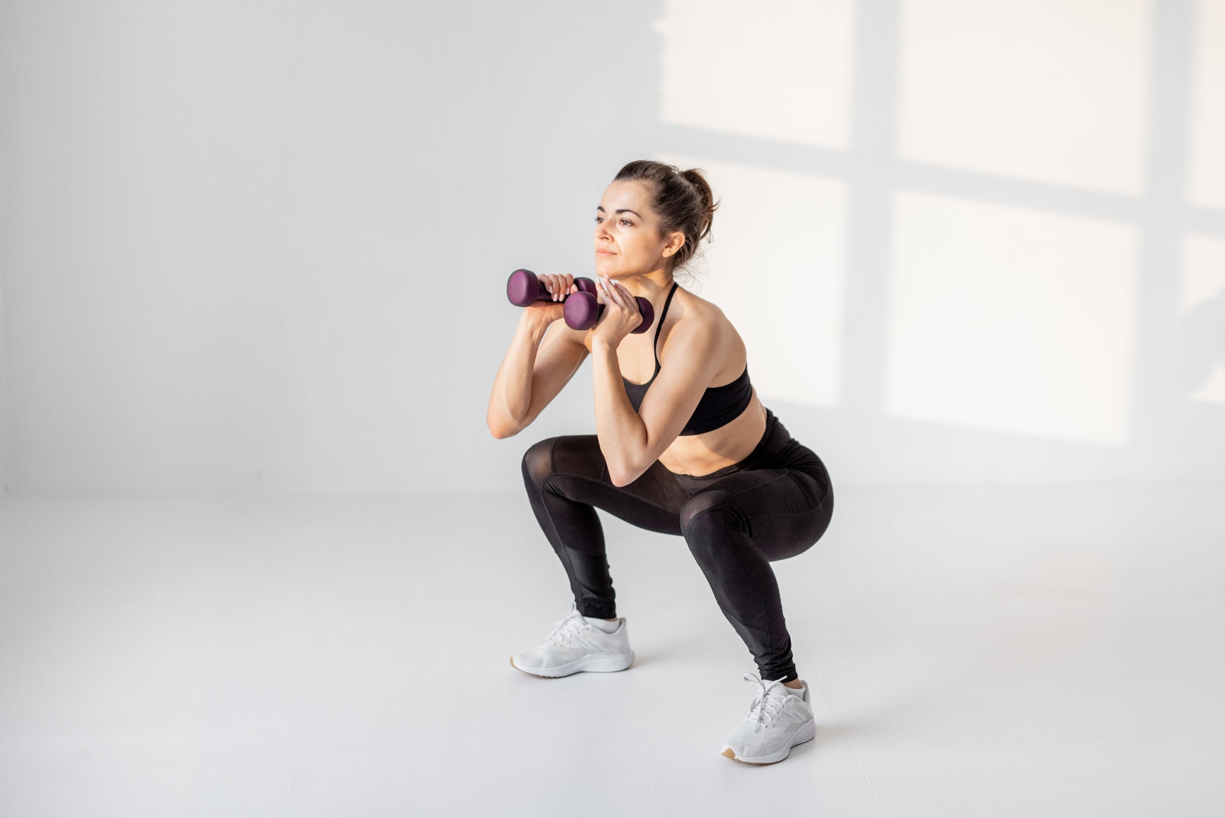 Try This Total-Body Dumbbell Workout for New Years Resolutions