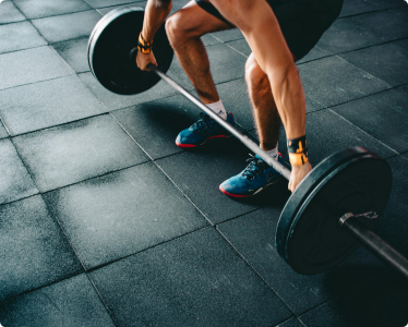 Photo of man lifting weights