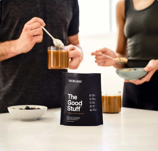 Photo of The Good Stuff Performance pouch with a man stirring the Good Stuff into his coffee and woman eating oatmeal in the background 